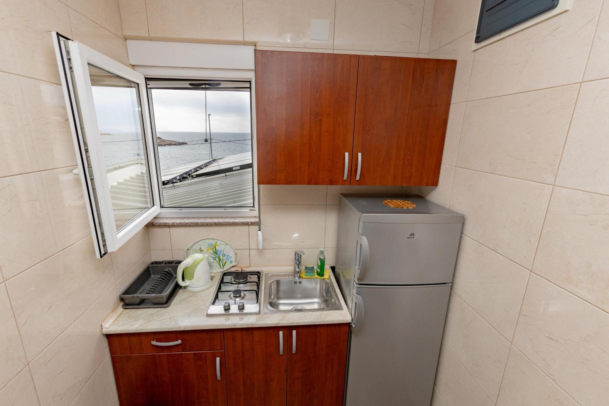 Apartments Oliva อัตเจฮะห์ ภายนอก รูปภาพ